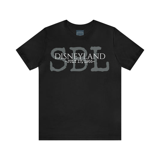 Unisex Jersey Short Sleeve Tee Disneyland storybook land ride opening day 1955